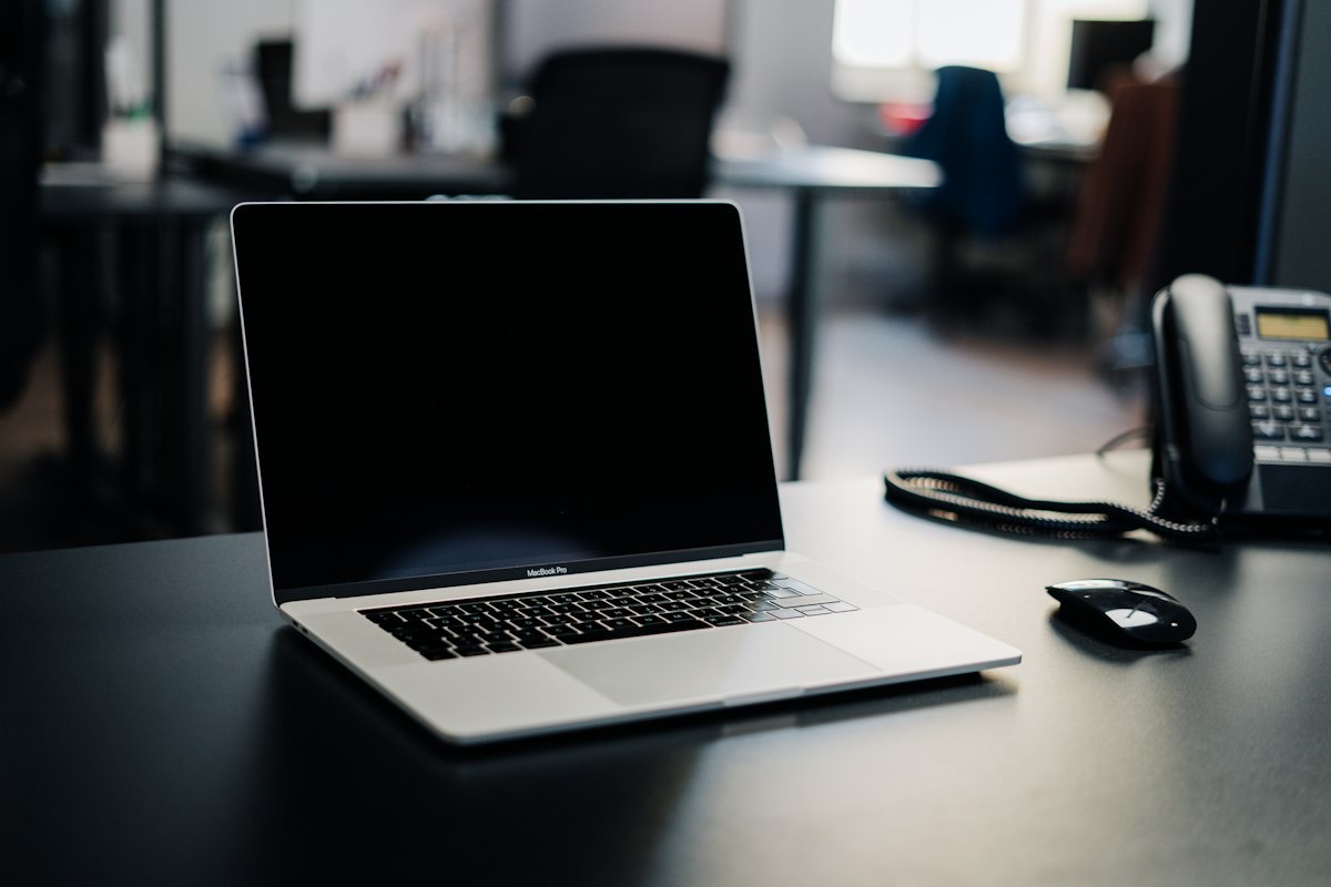 Desk phone and laptop workstation